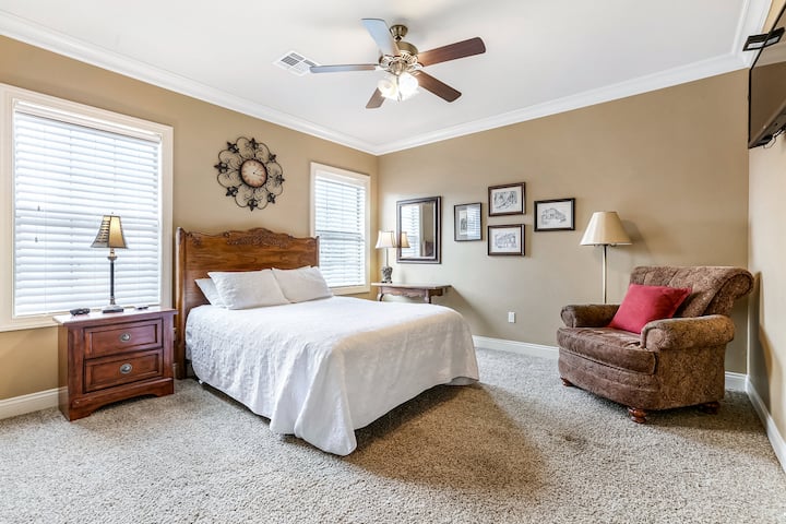 Main Home- Queen Bedroom with private stand up shower bathroom.