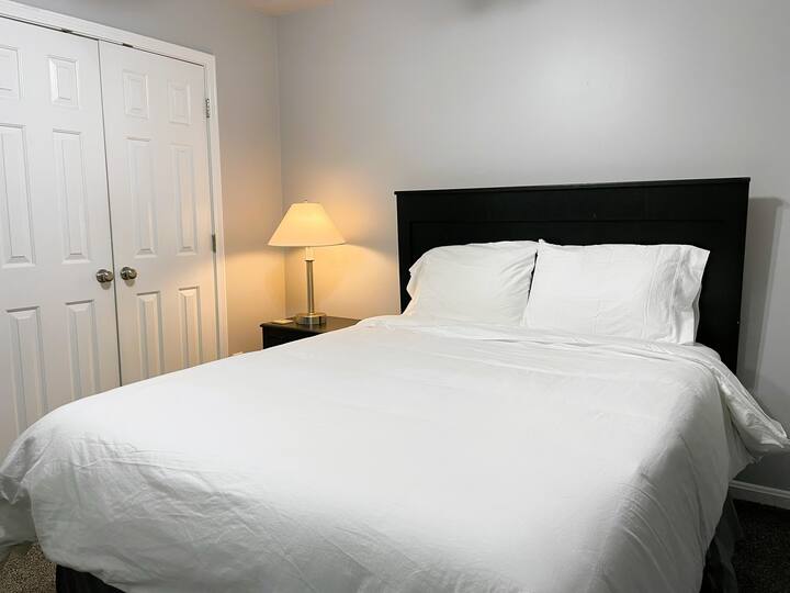 Bedroom #2 with queen sized bed and double closet