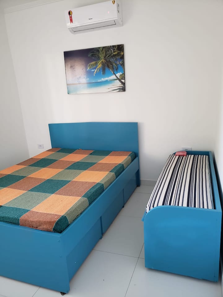 Lower suite with 1 double bed and a sleeping chest.