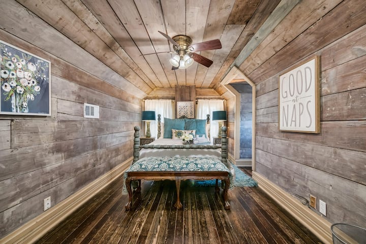 3rd floor bedroom with a comfortable full size bed and TV.