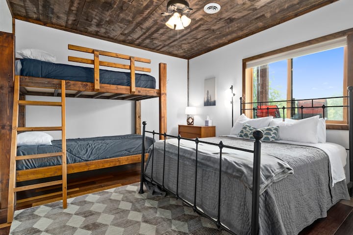 Basement Bedroom 5: Queen bed and twin size bunk beds