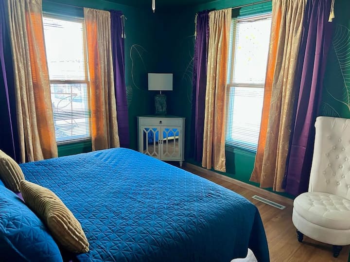 Main floor bedroom with king bed