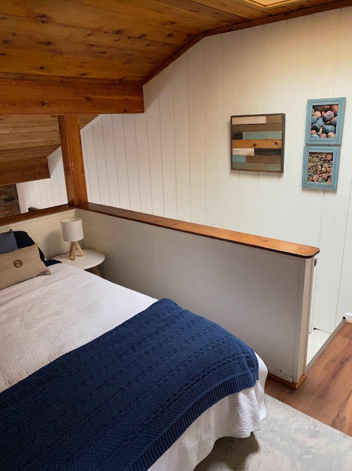 Heading back out to the loft, take the stairs down to the main level.