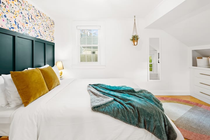 Queen bed with ample storage in this bedroom.