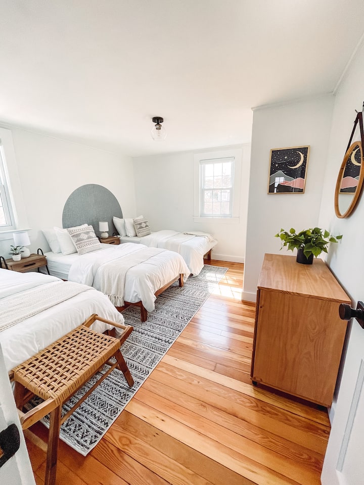 The bright and cozy second bedroom features 3 comfortable twin sized beds , dresser, and closet.  Childrens books are tucked away in the nightstands to help with bedtime :).