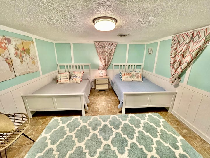 Basement bedroom.  Two full beds, memory foam mattresses 