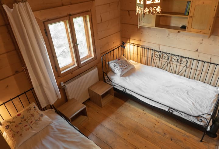 Chambre avec deux lits simples