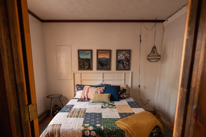 BEDROOM - The downstairs bedroom has a queen bed with casper mattress. The quilt is handmade and extra cozy!