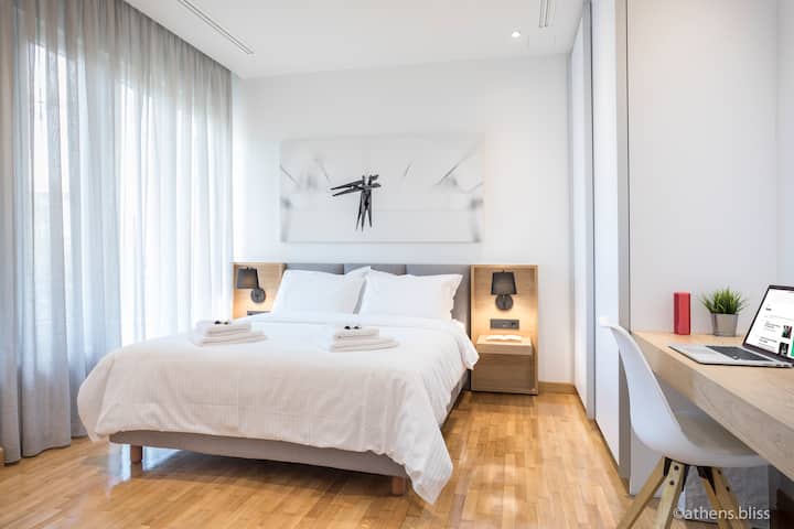 Bedroom 2 - Queen size bed, working space, balcony access, A/C