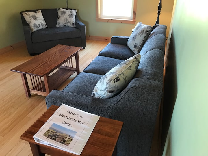 Our living area offers two fold out couches to accommodate additional guests. Roku and basic cable tv. Electric split AC and heat units.