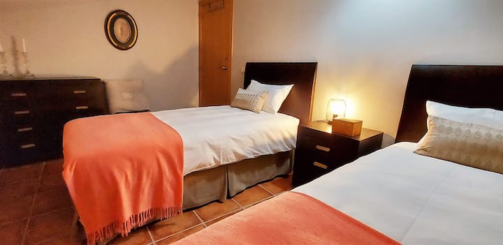 Bedroom no. 3, located on the upper floor of the duplex. Loved ceiling with 1 window, two 90 cm beds each, comfortable, spacious closets, underfloor heating.