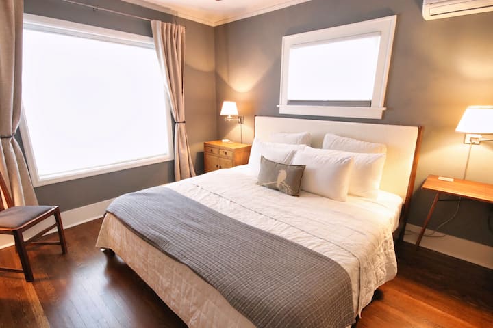 Primary Bedroom (KING) overlooking the backyard. 50" TV