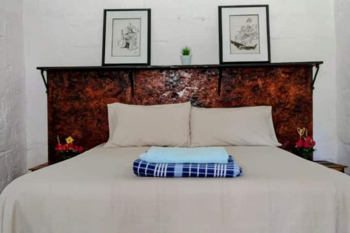 Queen bedroom with en-suite bathroom and fresh linens