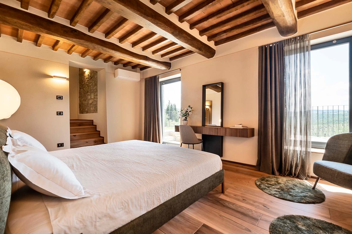 Cottage Bedroom 6 with superking bed, en-suite bathroom, with air conditioning and underfloor heating, bathroom products and slippers. Dressing room, mini fridge and coffee making facilities