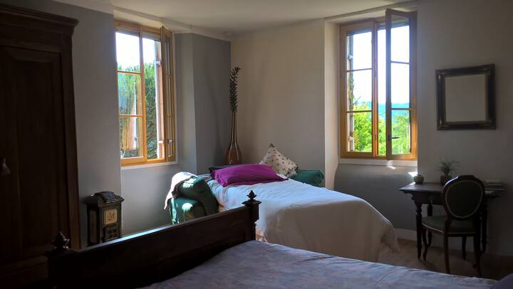Bedroom with views to the garden and Pyrenees