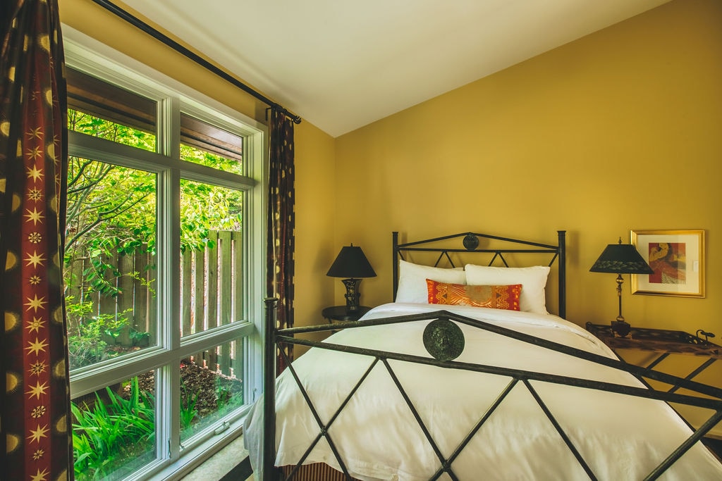 The fourth bedroom comes with a comfortable queen-sized bed