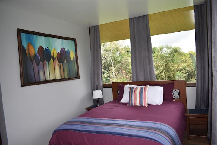 This first floor suite has garden views and luxurious pillow top queen size mattress.