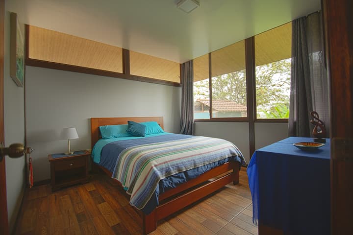 This first floor double bed has floor a shared bath.