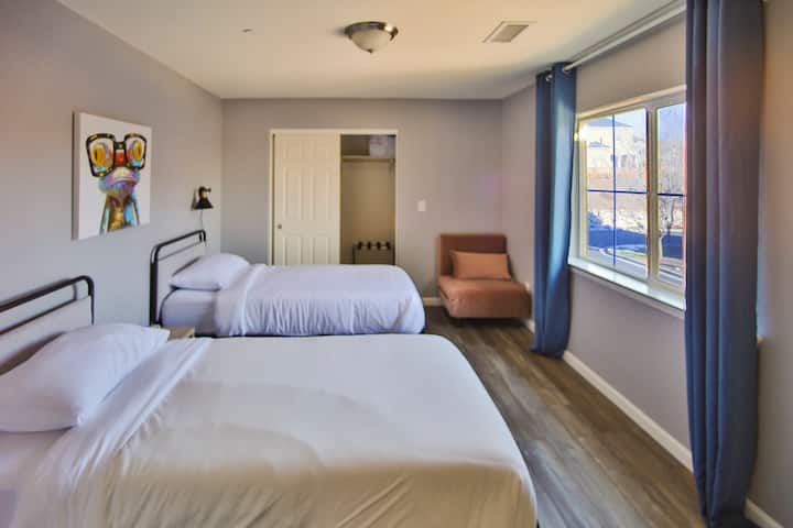 The fourth room provides two comfortable single beds and a sleeper chair bed. Great for 3 adults or children. 
