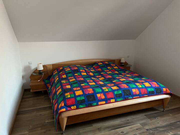 Bedroom 1 double bedroom (master bedroom) in DHH with daily window in the gable 