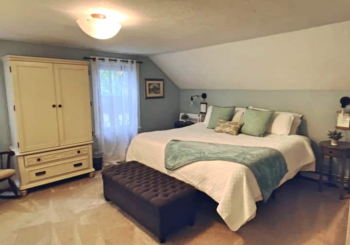 Calming decor and a super comfy king-sized bed in the master bedroom. 