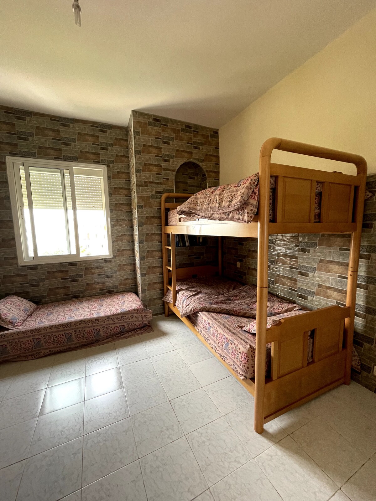 1er dormitorio (5 camas - Vista a la piscina / mar)