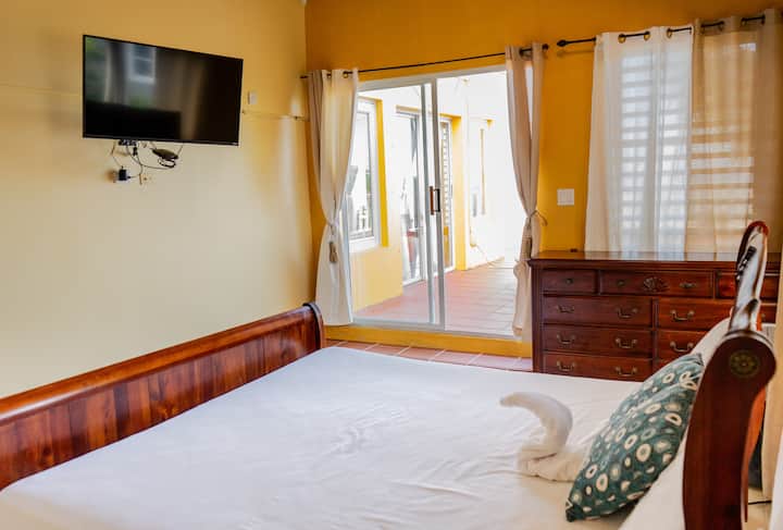 Oh, what an ambiance!!! The sliding door that leads to the balcony lets you take in the stunning scenery from the comfort of your room.