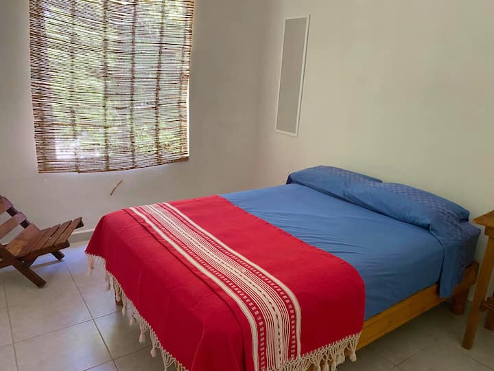 Tretia izba na poschodí s klimatizáciou a šatníkom.