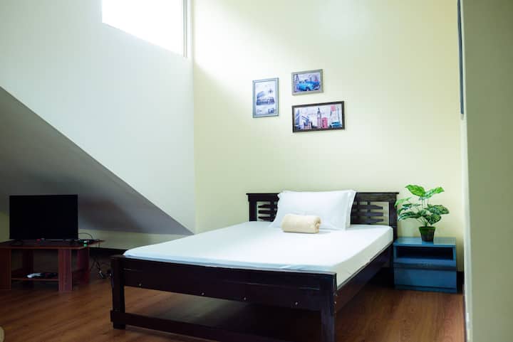 Attic room with aircon
With TV (with cable)
2 double beds 
1 sofa bed