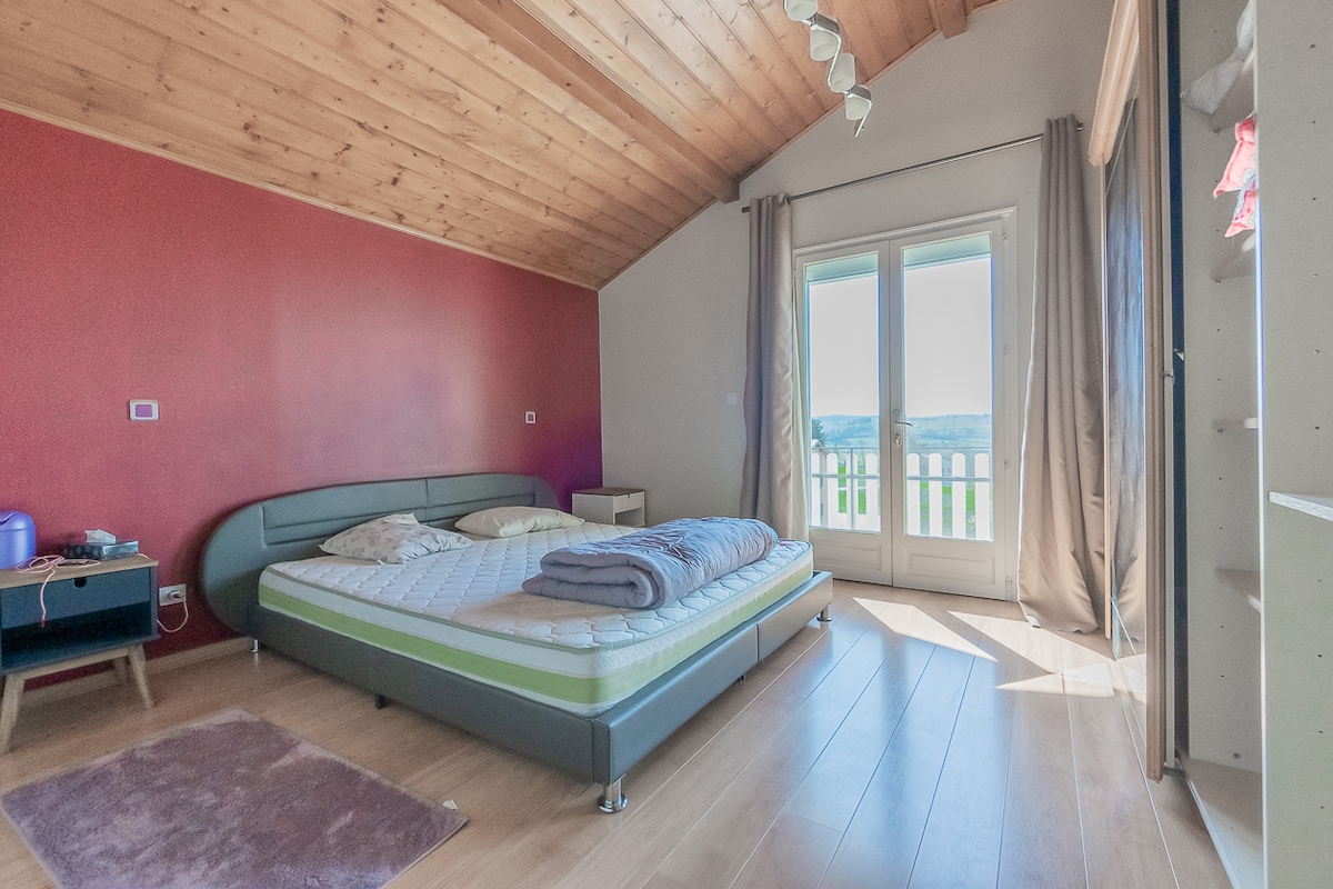 1st bedroom, upstairs, king size bed with LED, balcony, electric roller shutter and mosquito net, table fan