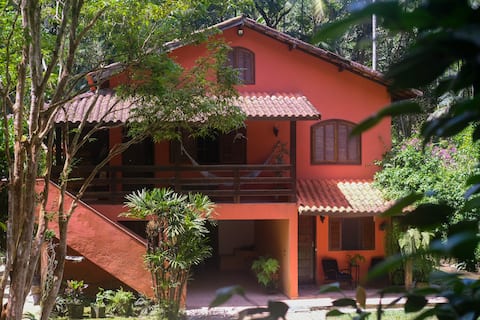 House in Penedo with waterfall
