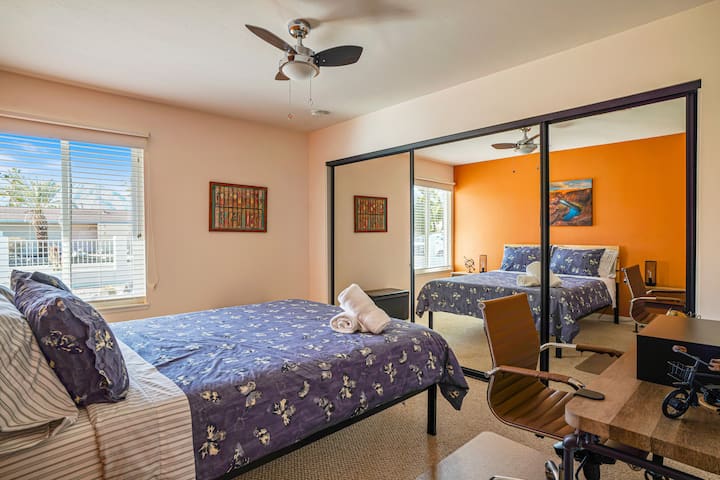 The second bedroom looks out on the front yard...