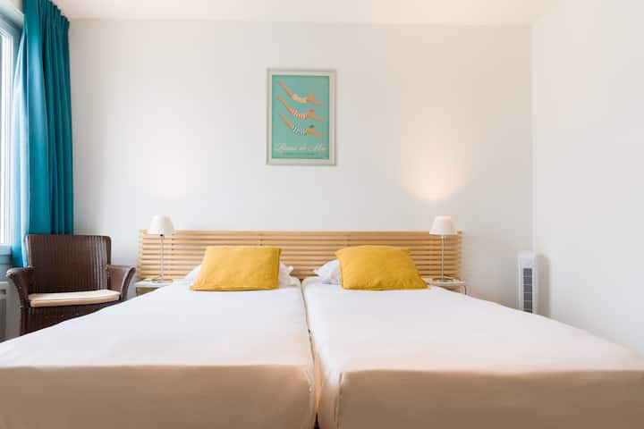 Chambre avec lits séparés