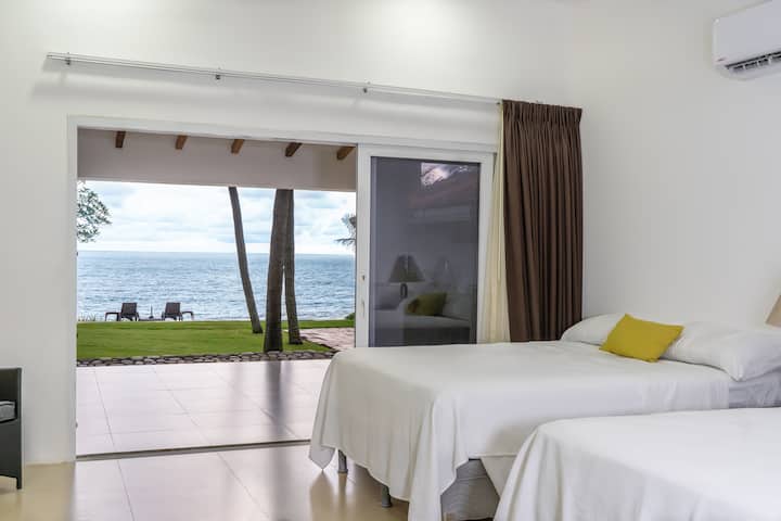 bedroom 4; Sunlit and welcoming, this versatile room sleeps up to four with two queens, a single, and an air mattress — built for laughter, late-night chats, and lazy mornings.