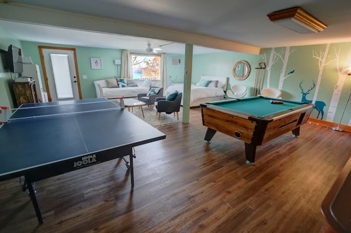 Games Room with Queen bed, 2 single beds and sofa bed.