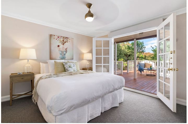 Swing doors open onto large terrace|deck... We call this one, the Shiraz Room.  King bed can be split into 2 (fee applies). 