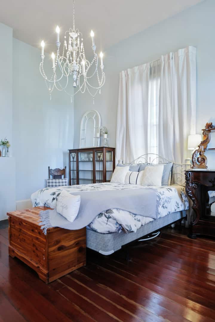 Front bedroom with water views. Opens to front porch. 