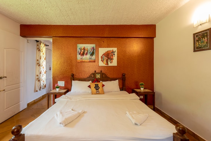 The bedroom is adorned with soft, plush pillows and a cozy, inviting comforter that beckons you to sink into its embrace. The walls are painted in soothing, warm tones, creating a serene ambiance that instantly puts your mind at ease.