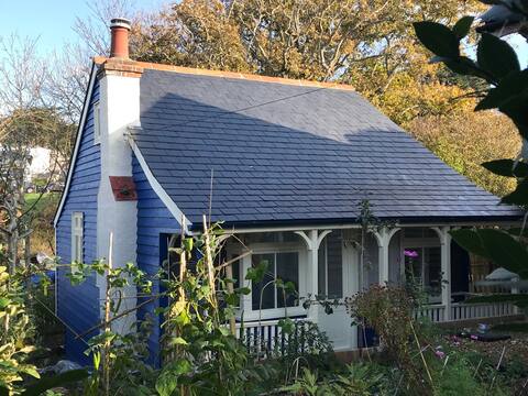 A charming little wooden house by the sea