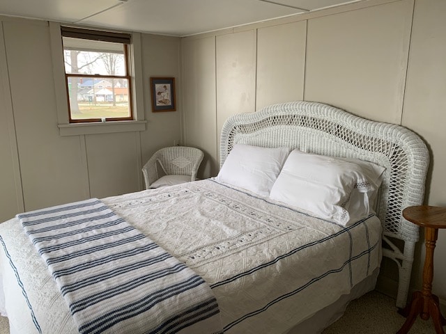 Main bedroom; windows look out to the north and east lake views