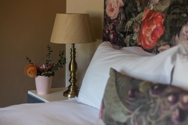 Beautiful Main bedroom with fresh cut flowers, always!