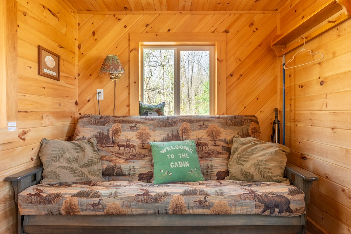 Comfortable futon couch 
pulls out into a double bed.