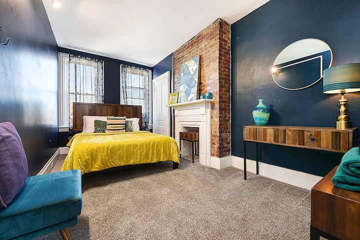 Bright & colorful, the first bedroom features a queen mattress, and welcomes you in for a relaxing evening.