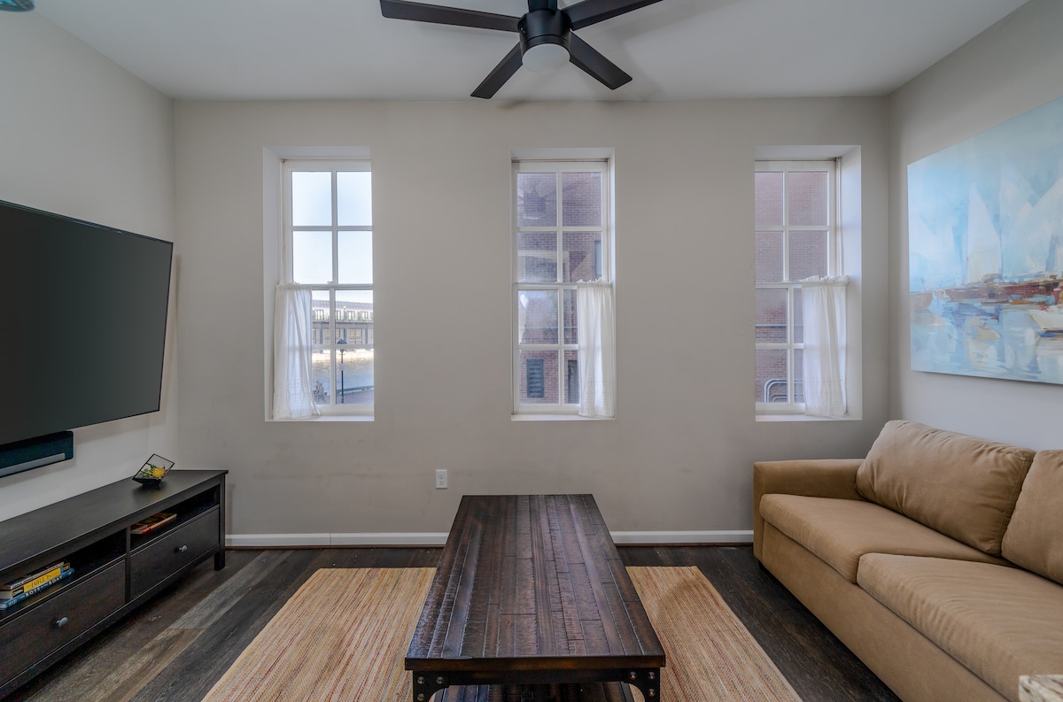 The 75-inch TV and Sleeper Sofa in the Studio Suite Living Room make a great extra sleeping spot- especially for parents who want to keep a close eye on their kids!