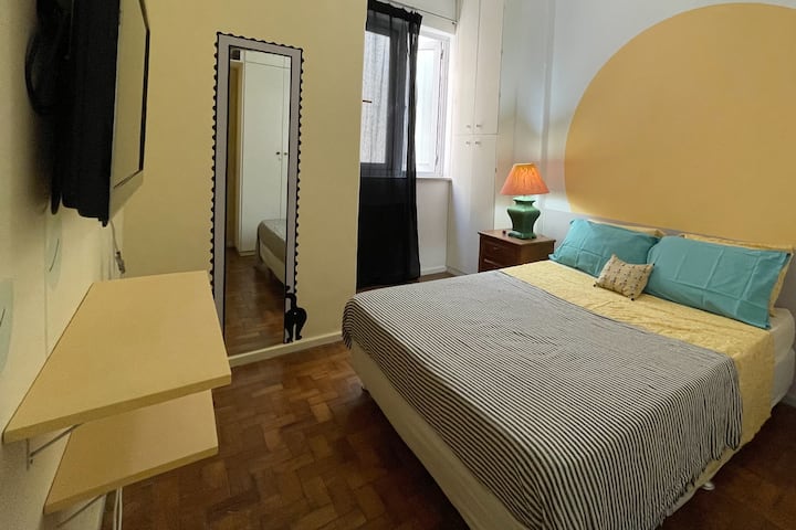 Bedroom, bed and special shoes closet near de window.