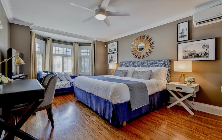 The Garden View Bedroom (2nd floor)
A second master-sized bedroom, King bed with luxury mattress, large bay window, hardwood floors, additional sleeper sofa daybed made up upon request, desk, built-in closet, 50" TV and light filled garden views.