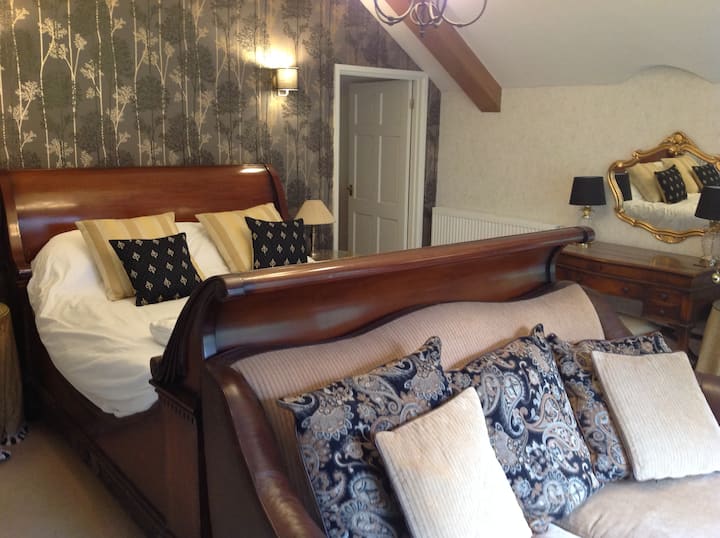 Bramble suite has a beautiful 5ft sleigh bed.