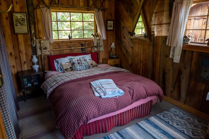 Inside Large Cabin. Queen sized bedroom