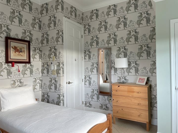 Twin bedroom with en-suite bathroom.