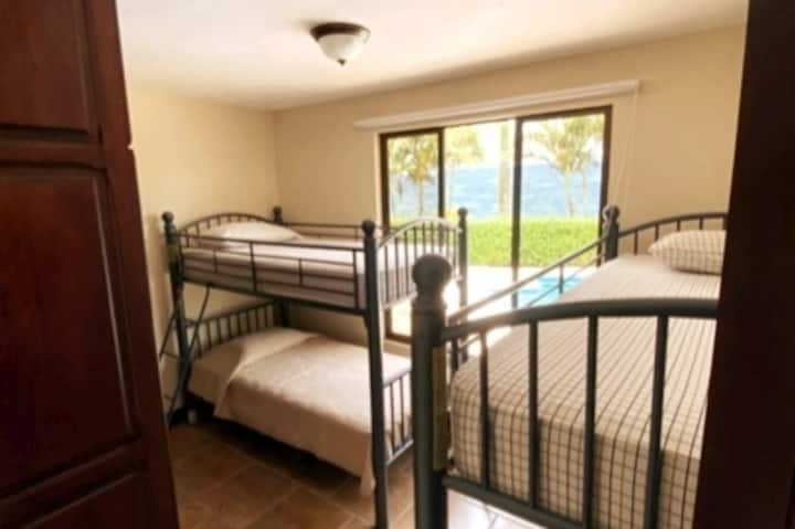 Third room, very comfortable, with a large clothing rack.